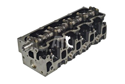 Engine cylinder head on a white background with 'AMC' branding.